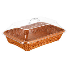 cesta de ratán tejida a mano con para pan, y verduras