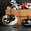 black plastic cauldron set with rack for halloween candy and decor 11
