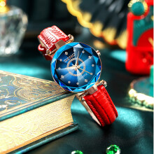 (Blue face with red leather strap) This Ocean Heart quartz watch with diamond and steel bracelet is a women's waterproof watch