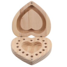 wooden heart-shaped essential oil capsule holder with grids
