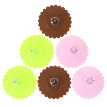 6 tampas p/ 10,5 cm c/ flor, silicone transp, antipoeira