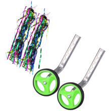 set of children's bike training wheels with green rack and ribbons