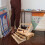 wooden tabletop display rack with drawers and easel design 7