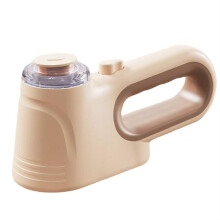 Macchina da stiro portatile con funzione vapore per la stiratura dei vestiti a casa. Adatta per i viaggi.