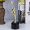 1 troféu metálico para 10