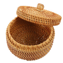 runder rattankorb aus geflochtenem rattan für tee und