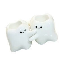 Elegant Hug Tooth Figure Toothbrush Holder for Modern Bathroom