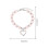 collar con colgante corazón, y s rosa 2