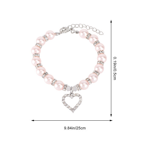 collar con colgante corazón, y s rosa 1