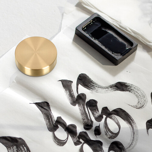 para de caligrafía china redondo de latón 2