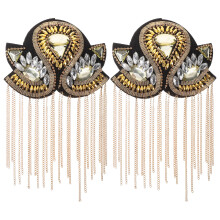 spalline d'oro in metallo con nappe e frange per costumi e