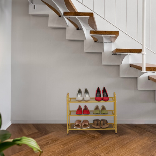 Goldenes Schuhregal aus Metall 1