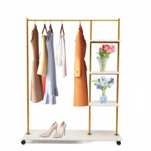 Elegant Gold Clothing Rack with 4-Tier Shelves & Universal Wheels - Perfect for Wedding Dresses & Bridal Garments