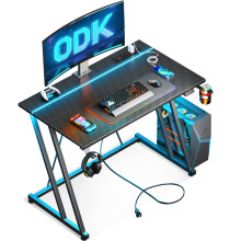 ODK Gaming Desk with LED Lights & Power Outlet, Gaming Table with Cup Holder and Headphone Hook, Double Z Frame Design Computer Desk Carbon Fiber Bla