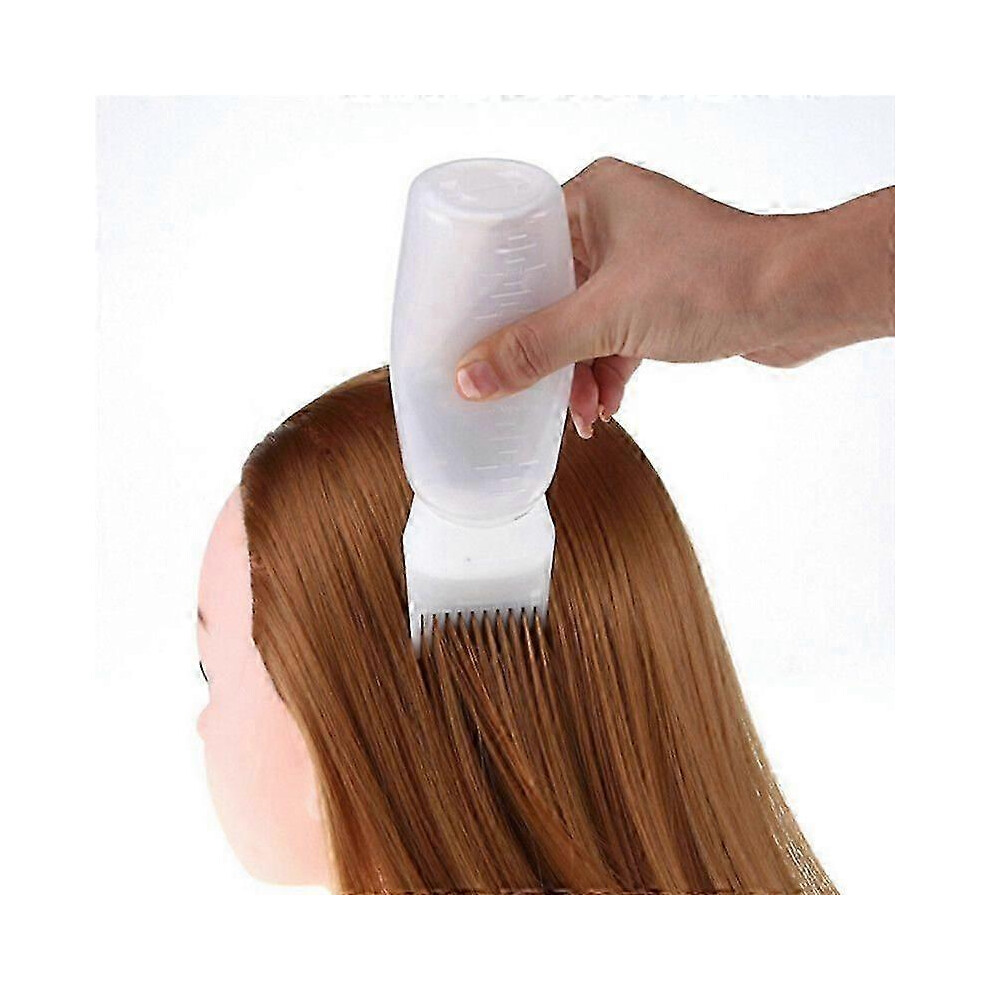 Empty 120ml hair dye bottle with applicator brush for salon use, refillable for hair coloring and care.