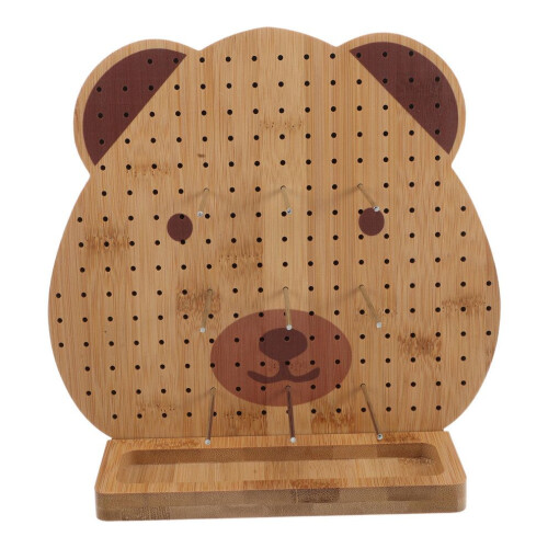 Tablero de madera con clavijas de bambú para proyectos de crochet.