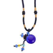 Haarhanger met parfumflesje en ketting (mode)