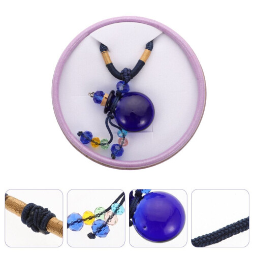 Haarhanger met parfumflesje en ketting (mode) 2