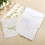 5 invitations d'anniversaire avec découpes et nœuds (blanches) 3