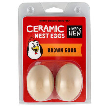 Gallina felice tratta le uova di nido in ceramica marroni
