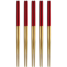 Hashis elegantes em aço inoxidável, reutilizáveis e com cabo confortável, perfeitos para refeições asiáticas e para uma mesa sofisticada.