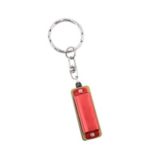 Zwaan sleutelhanger mondharmonica, 4 gaten, 8 tonen, toonsoort C