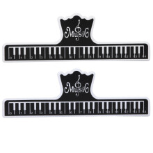 2 stuks plastic paginahouders voor muziekboeknoten