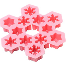 Moules élégants en forme de flocons de neige, en silicone alimentaire rose, pour un démoulage facile et une résistance à la chaleur.
