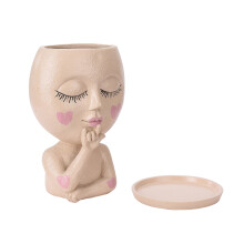 Vasos decorativos exclusivos para plantas, em resina, com formato de rosto, para uso interno e externo. Possuem furo de drenagem e estão