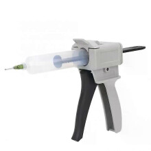 Distributeur de colle thermofusible 30 ml en plastique, manuel, à tube unique et poignée.