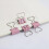 60 clips metálicos con forma de corazón, color rosa. 6