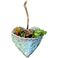 Vaso in resina per succulente vive di facile cura, ispirato al vaso in terracotta smaltata, il foro di drenaggio favorisce radici sane, la