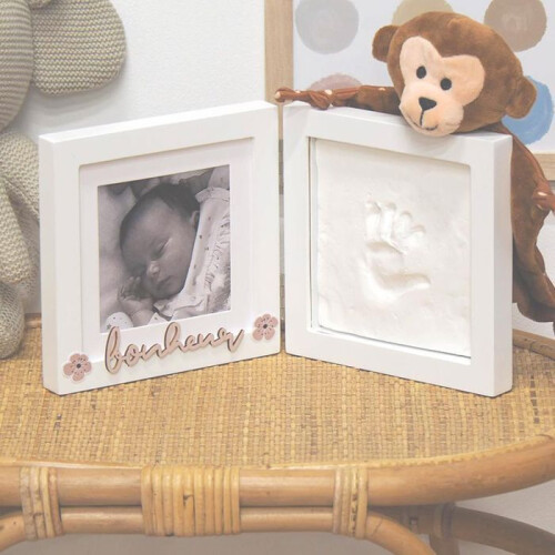2 Bilderrahmen und Babyabdrücke 1