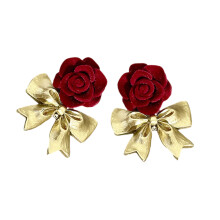 Boucles d'oreilles artisanales élégantes à nœud papillon Rose,