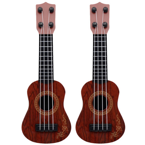 2 Bambini Ukulele In Strumenti Musicali Educativi