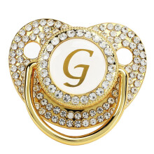Baby Bling Speen met Clip: Veilig, zacht siliconen en goudkleurig design.