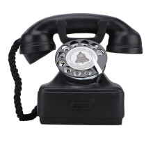 Vintage gammeldags bordtelefon med ledning, ikke-funktionel udstillingsenhed med moderne teknologi, fastnettelefon i retrostil til