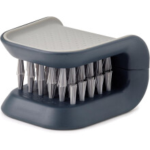 Limpiador de cubiertos con mango de plástico resistente para un lavado de vajilla seguro y eficaz. Su diseño en forma de U ofrece mayor seguridad.