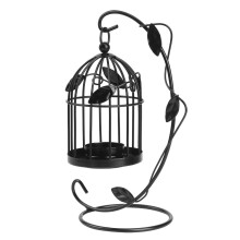 O simfonie poetică de lumină și formă, decor vintage din metal, sub formă de suporturi de lumânări în formă de colivie, captivând inima și