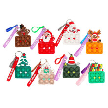 Eindeloos herbruikbaar, schattige kerstpatronen, stressverlichting voor volwassenen en kinderen, mini kerst sleutelhanger met drukknop, draagbaar