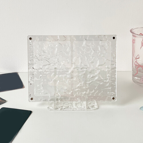 Le support de porte-cartes de visite en acrylique présente un-B 1