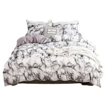 Luxe beddengoedcollectie met marmerprint, kreukvrije en onderhoudsvriendelijke lakenset, zachte materialen met een modern design, actieve