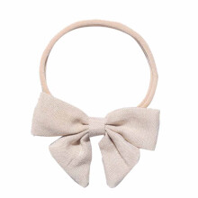 Beige Babymutsje Met Strik Duurzaam Hoofdband Foto's