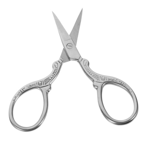 Small vintage snips with fine handle design for DIY projects at home and sewing shops.