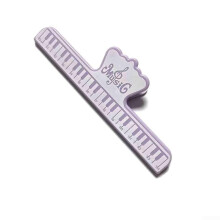 Essential sheet music clip holder for guitar and violin, helps musicians maintain focus during practice (purple) violet