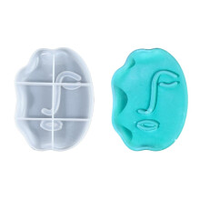 Artistically distorted flexible silicone mold of a human face for home decor and gift making
