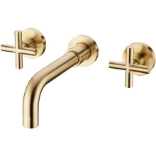 Elegante grifo de baño, diseñado para montaje en pared, con textura dorada cepillada que le confiere un toque de lujo, y construcción en latón