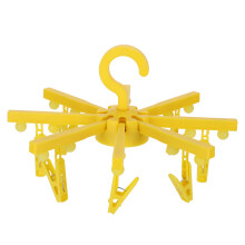 Stendibiancheria multifunzione per spazi compatti, appendiabiti pieghevole con design a polpo in giallo, realizzato in plastica trattata UV per una