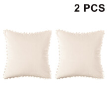 Decoratieve kussenslopen met pompons, vierkante fluwelen sierkussenhoezen voor een landelijke woonstijl.