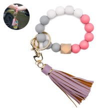 Damen-Schlüsselanhänger-Armband-Set, niedlicher Schlüsselring mit abnehmbarer Quaste aus Silikonperlen im Armreif-Stil, geeignet für drinnen und